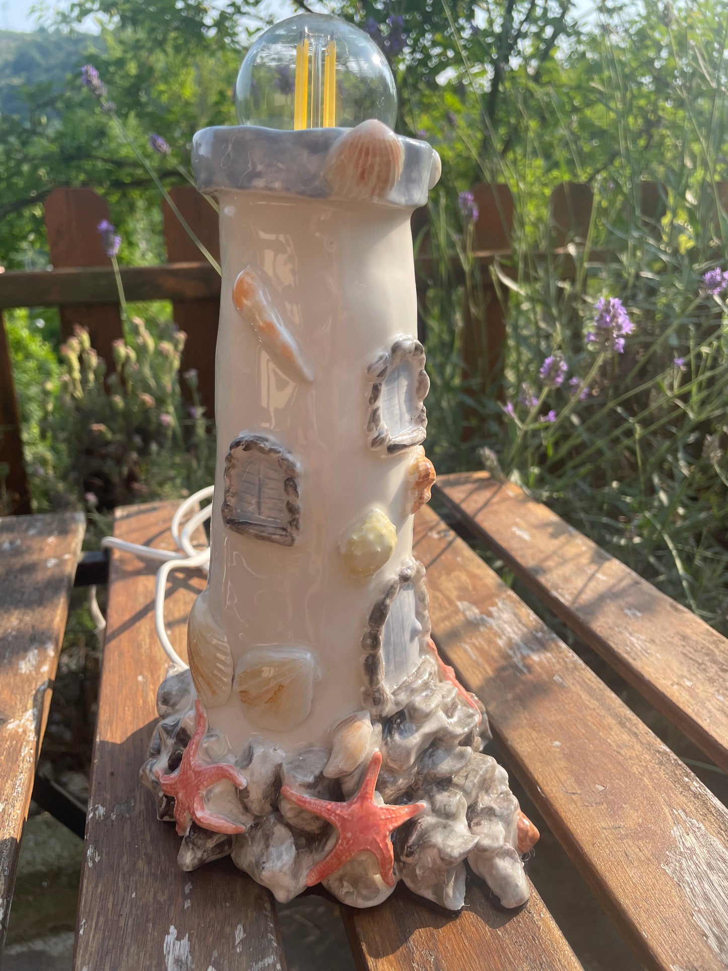 Lampada faro conchiglia