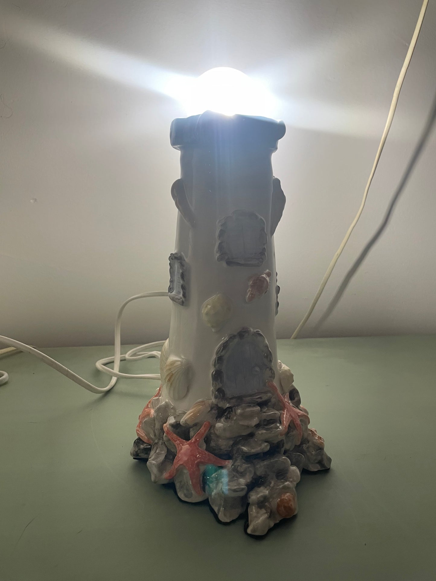 Lampada faro conchiglia