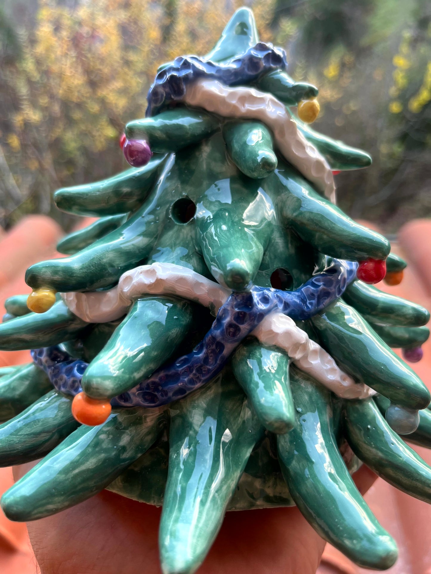 Albero piccolo decorativo e portacandela